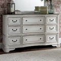 Commode antique blanc cassé à façade galbée, 9 tiroirs, avec plateau effet écorce vieillie