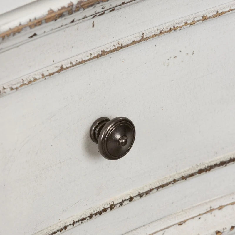 Commode antique blanc cassé à façade galbée, 9 tiroirs, avec plateau effet écorce vieillie